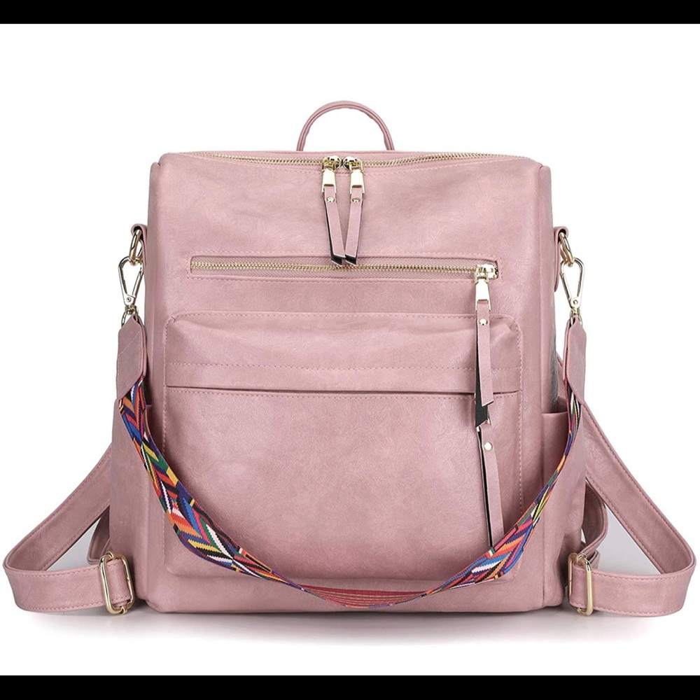 Used rose colored backpack purse
